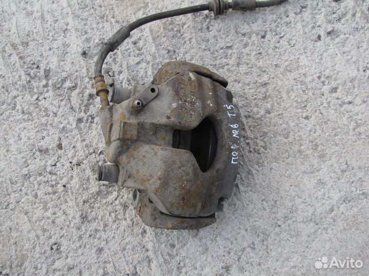 Суппорт передний левый Volkswagen Transporter T5