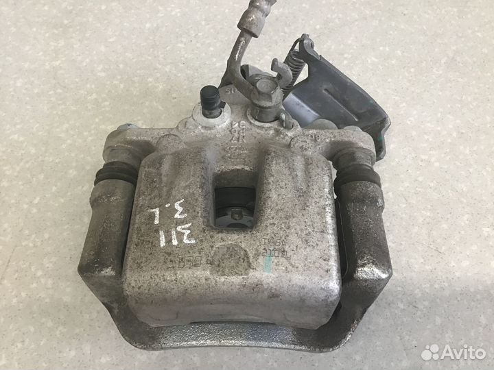 Суппорт задний левый Kia Cerato 2018