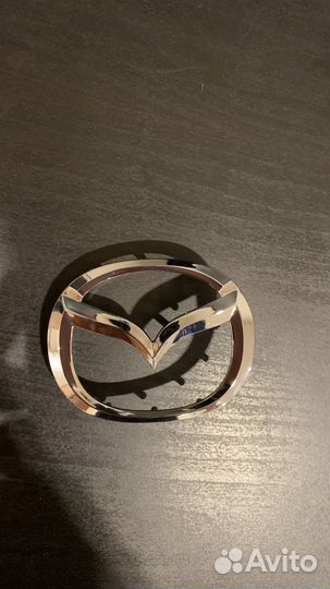 Эмблема руля Mazda