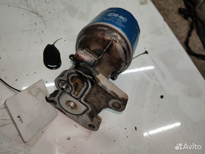 Кронштейн масленого фильтра Chevrolet Epica