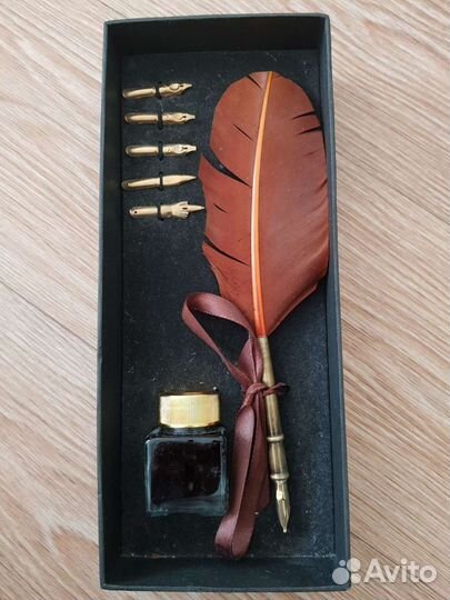 Перо с чернилами новое