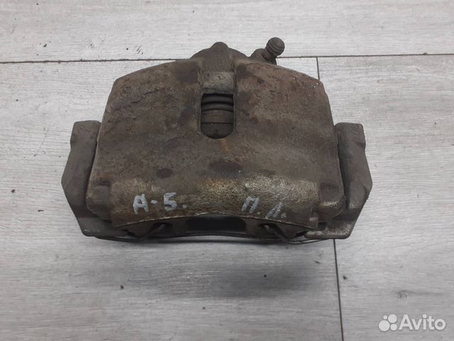 Суппорт передний левый VAG