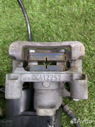 Суппорт тормозной задний левый Kia Sportage QL