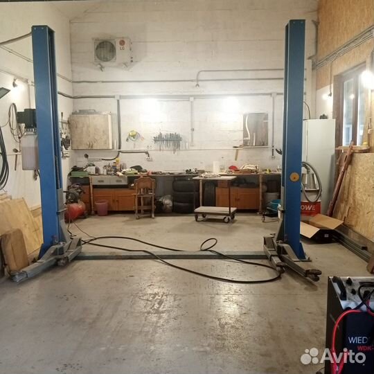 Подъемник автомобильный гидравлический