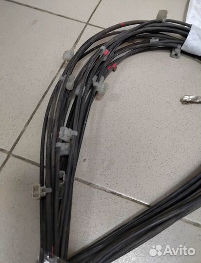 Трос лючка бензобака Mitsubishi Pajero Sport