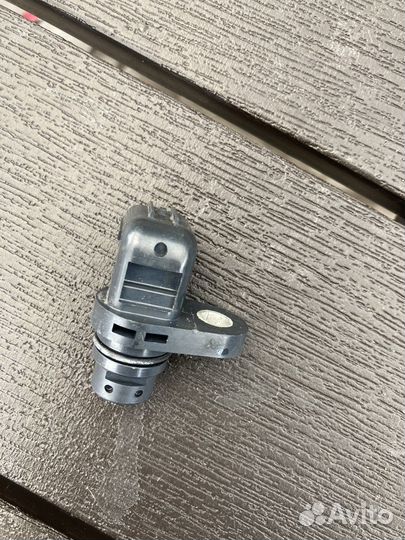 Датчик положения распредвала lancer 9