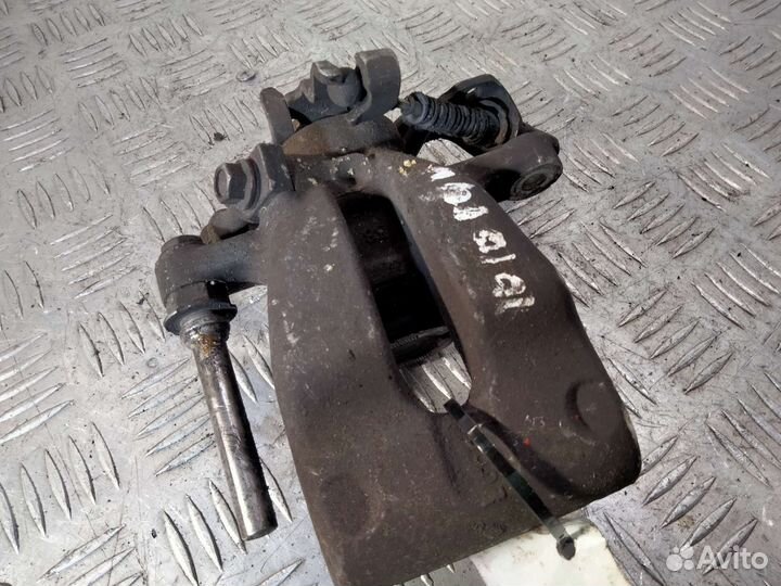 Суппорт задний левый Opel Astra H