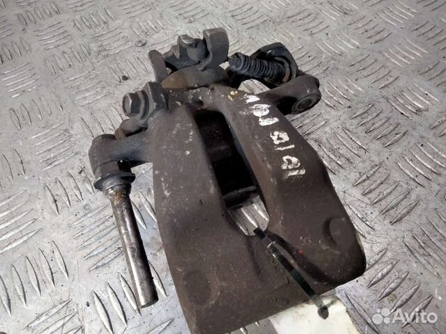 Суппорт задний левый Opel Astra H