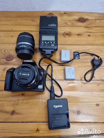Фотоаппарат Canon eos 1000d +вспышка +обьективы