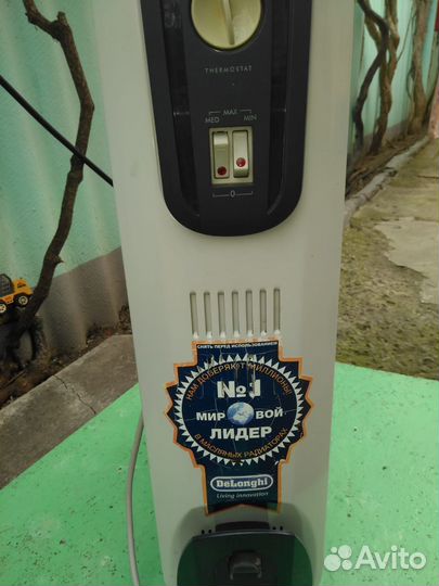 Масляный радиатор delonghi