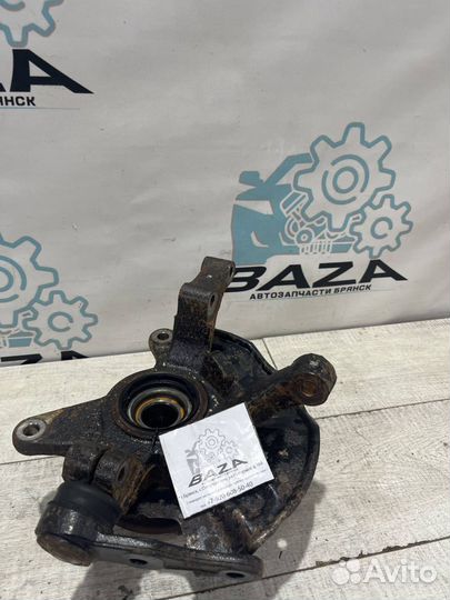 Кулак передний правый Kia Spectra