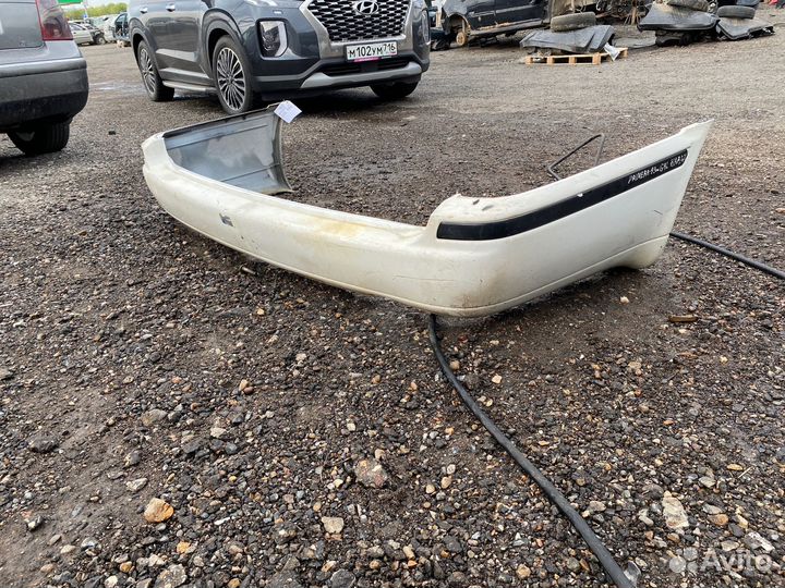 Бампер задний Nissan Primera 1993г