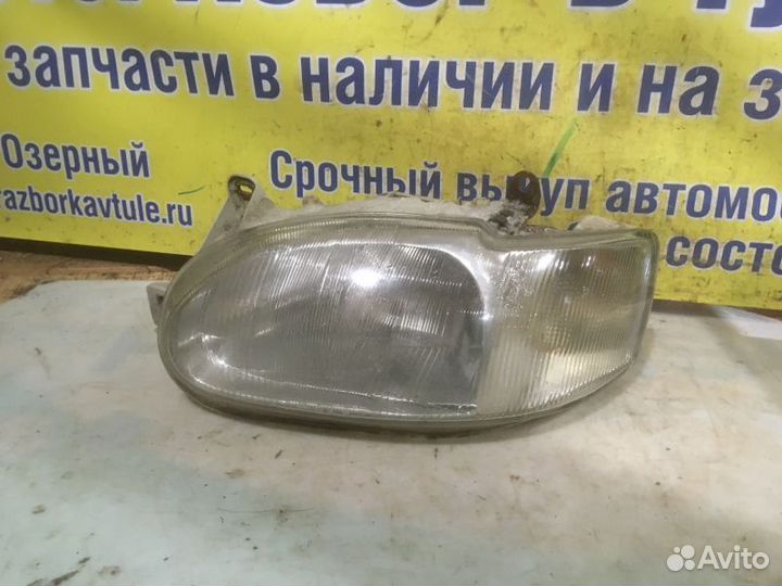 Фара передняя левая Ford Escort