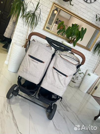 Коляска для двойни domino