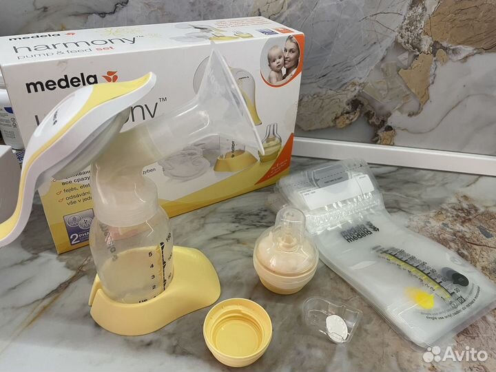 Молокоотсос ручной medela