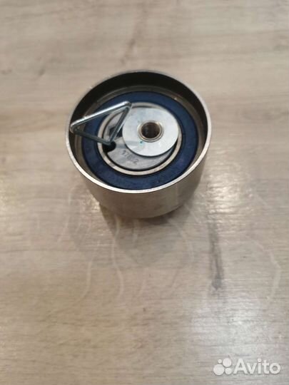 Ролик натяжной ремня грм на chrysler