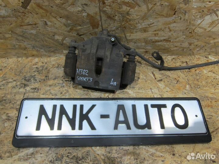 Суппорт тормозной передний Kia Sportage 3