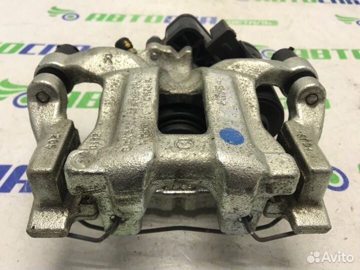 Суппорт тормозной задний правый Mazda 3 BP PE / P5
