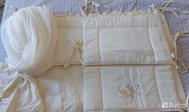 Детская кроватка с продольным маятником