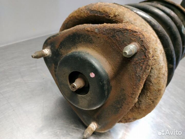 Стойка амортизатора передняя правая Mitsubishi