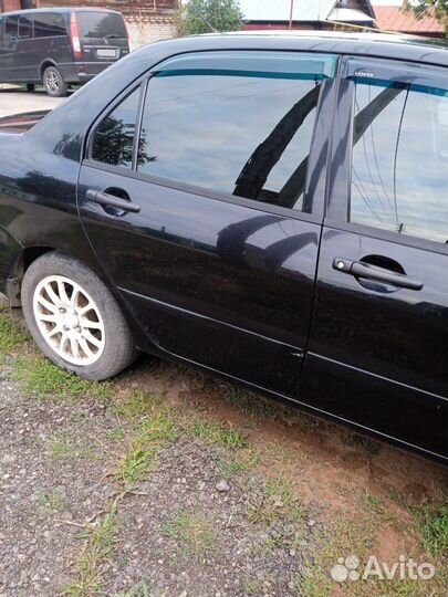 Mitsubishi Lancer 1.3 МТ, 2004, 220 000 км