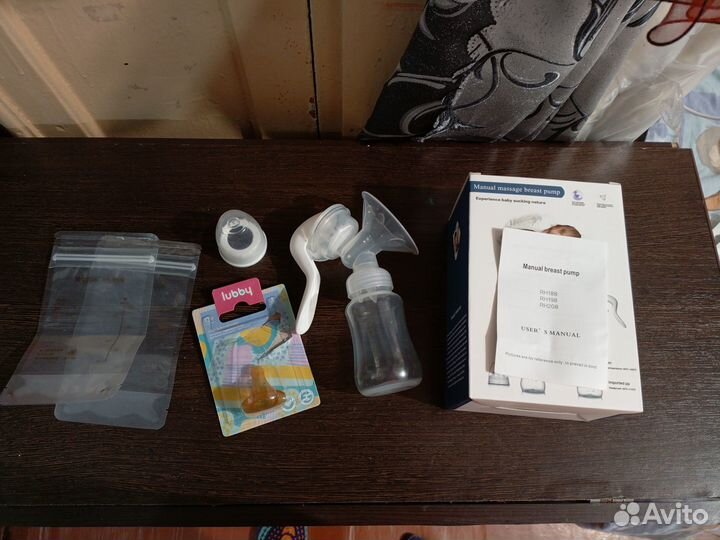 Молокоотсос механический ручной с бутылкой