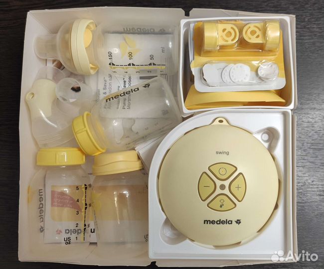 Молокоотсос medela электрический