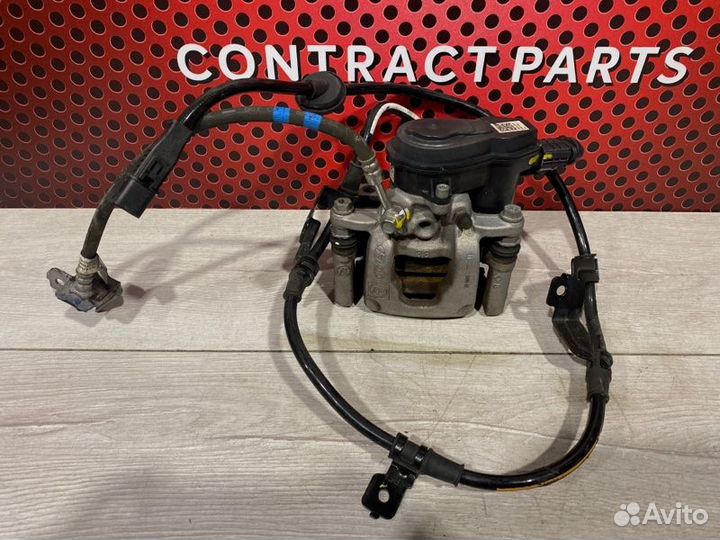 Суппорт задний правый Hyundai Tucson NX4 1.6T-GDI