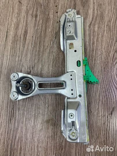 Стеклоподъемник задний левый Opel Astra J хетчбэк