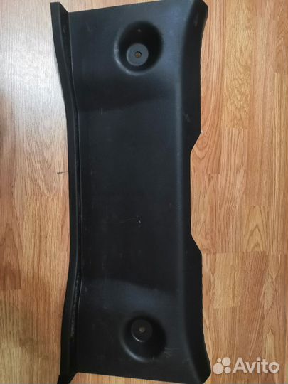 Пластик замка багажника tiida