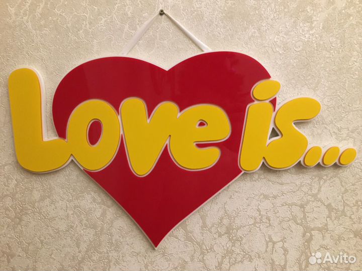 Надпись love is