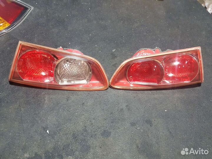 Фонарь в крышку багажника Mitsubishi Lancer 10