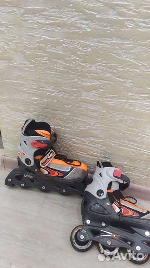 Роликовые коньки