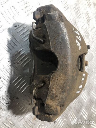 Суппорт передний правый Opel Astra H