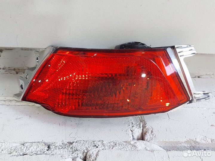 Фонарь противотуманный задний левый Land Rover