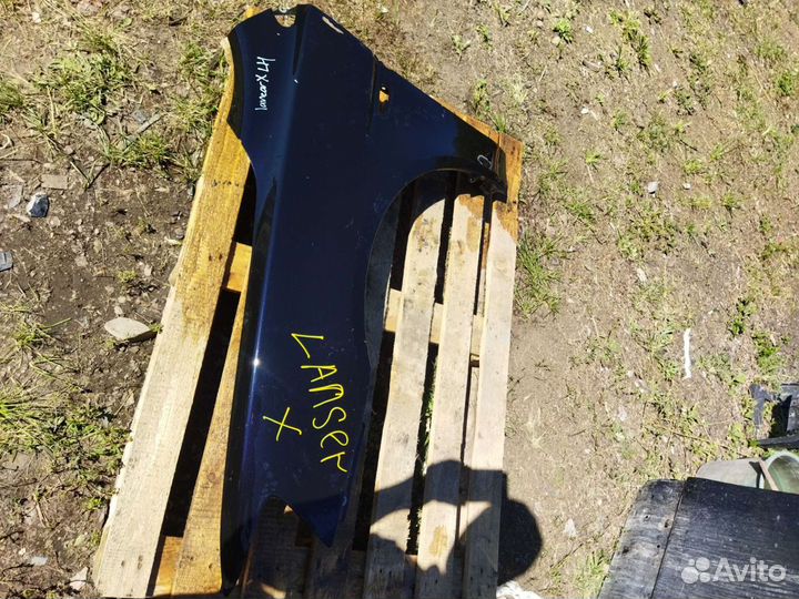 Крыло левое Mitsubishi Lancer X ремонт