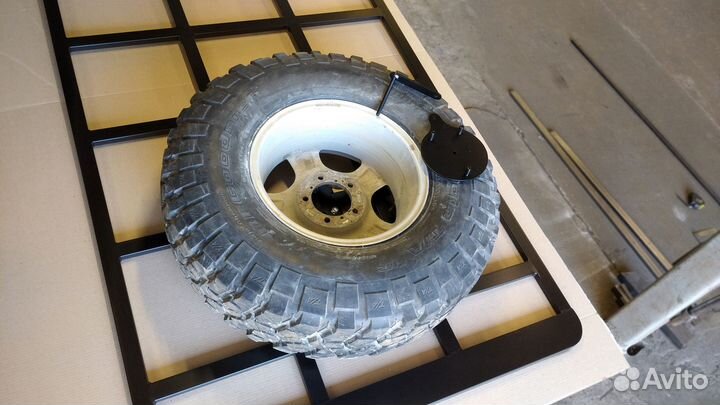 Крепление запасного колеса на крышу УАЗ Патриот