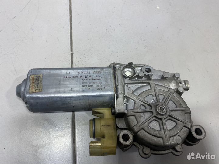 Моторчик переднего левого стеклоподъемника