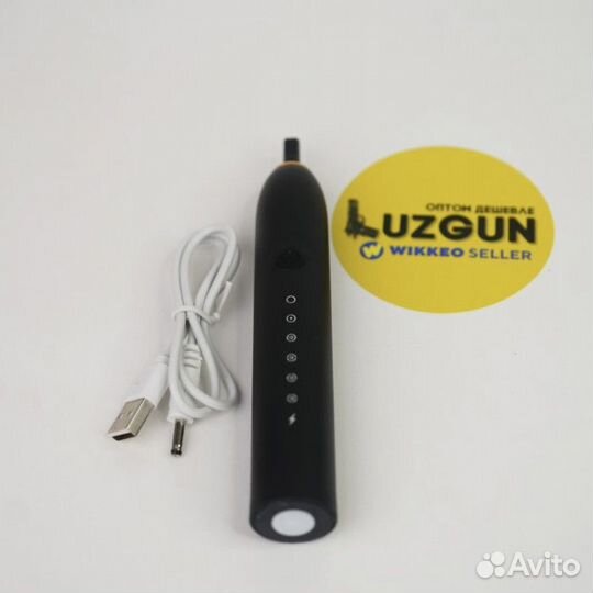 Электрическая зубная щетка