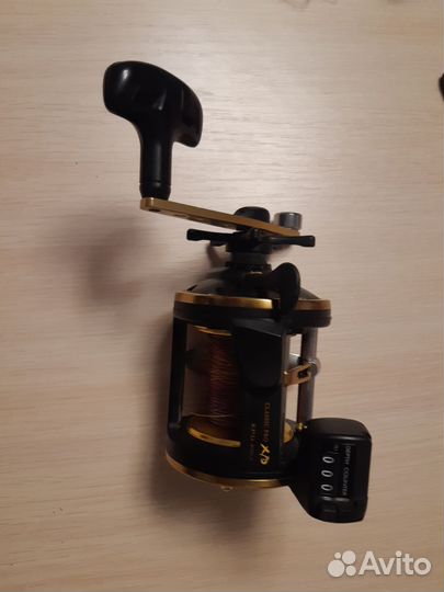 Катушка рыболовная мультипликаторная