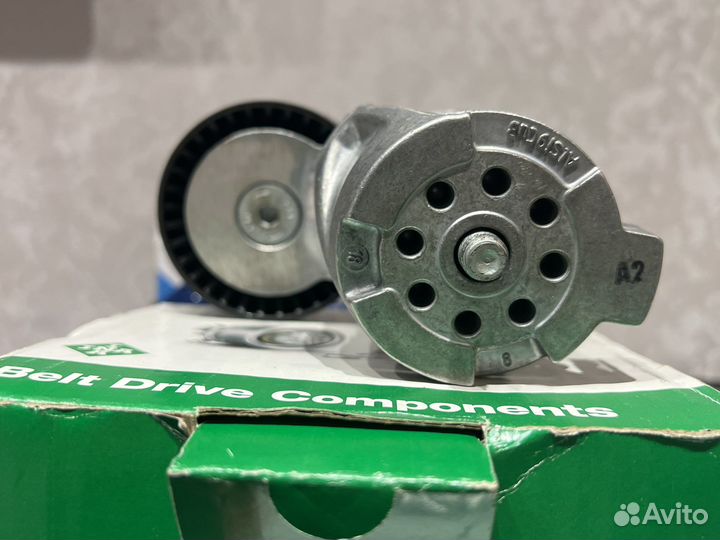 Натяжитель ремня INA новый е90