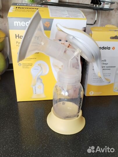 Молокоотсос medela ручной