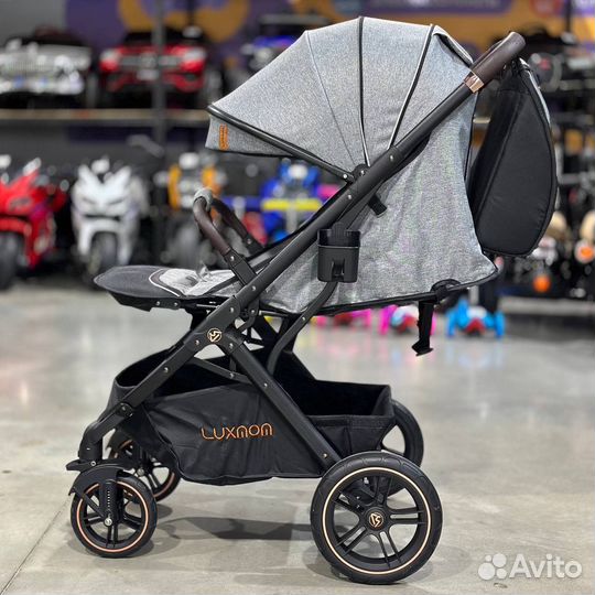 Новая прогулочная коляска luxmom серая