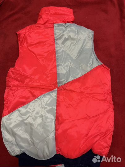 Жилетка пуховая женская