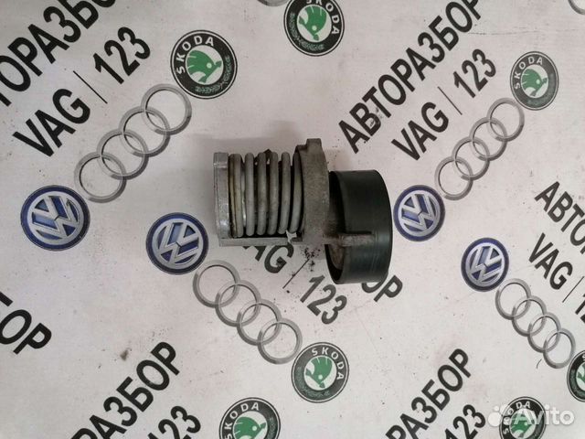 Натяжитель ремня генератора Фольксваген Гольф 5