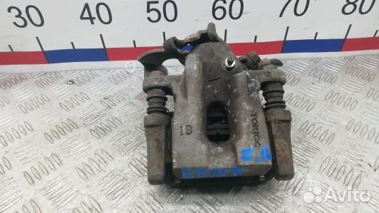 Суппорт тормозной задний правый toyota corolla E15