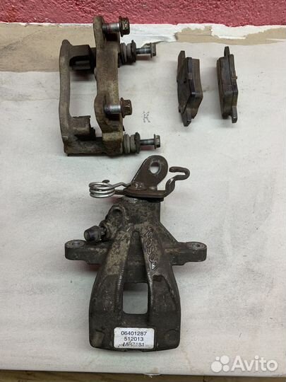 Супорт Джили Эмгранд X 7 задний левый