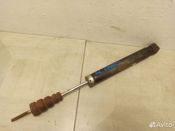 Амортизатор задний Мазда