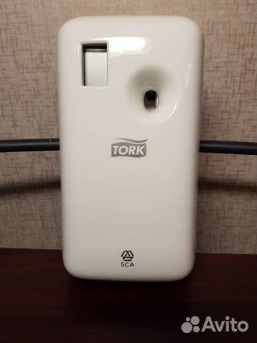 Диспенсер автоматический электронный фирмы tork