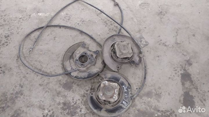 Nissan tiida задняя ступица колеса, трос ручника